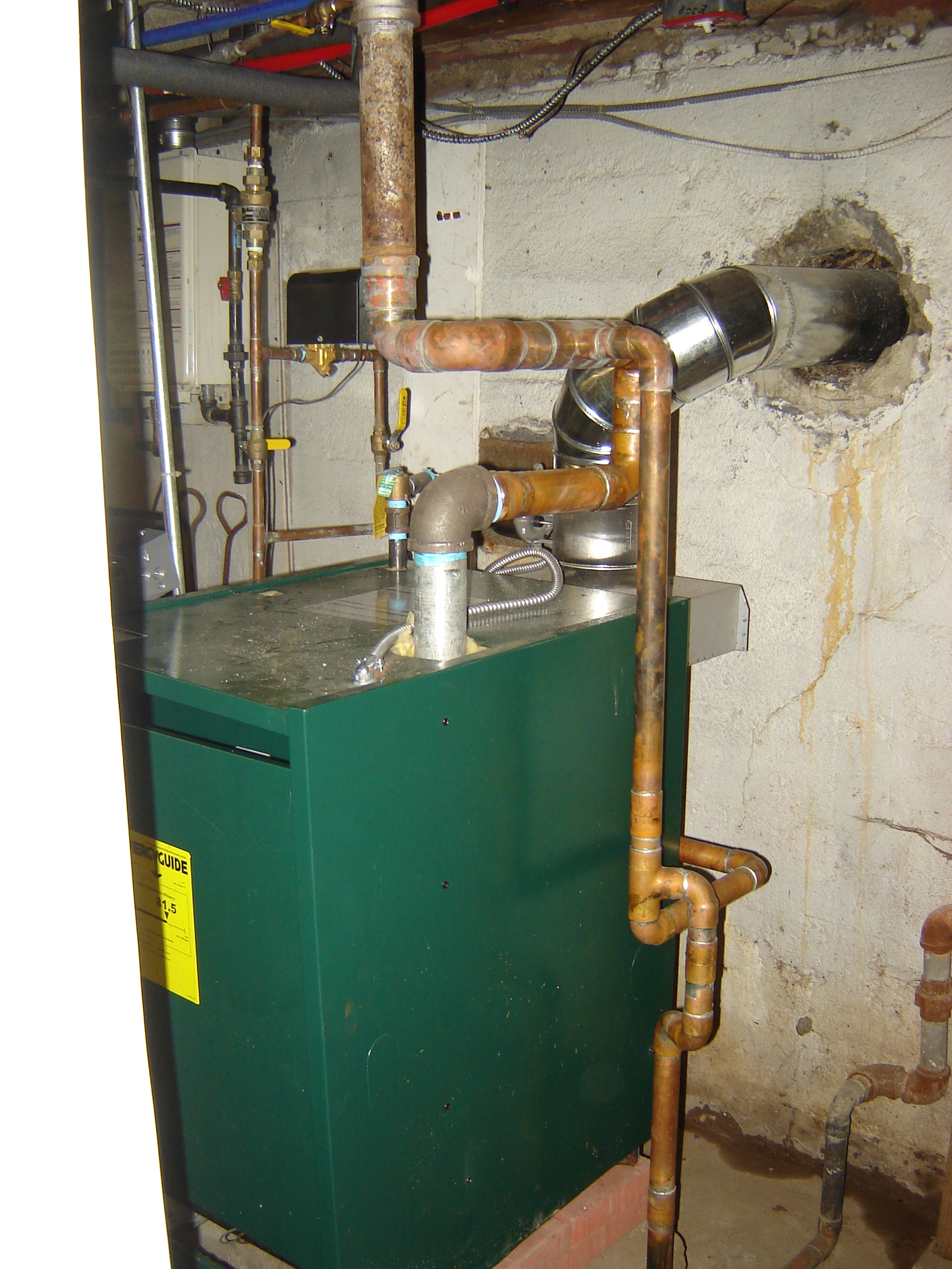 Near boiler piping — Heating Help The Wall